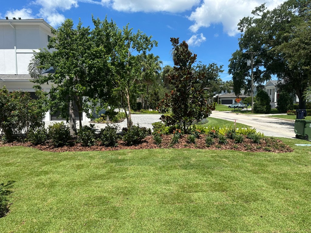 Example of Pennate's residential landscape projects with structured planting and clean bed lines